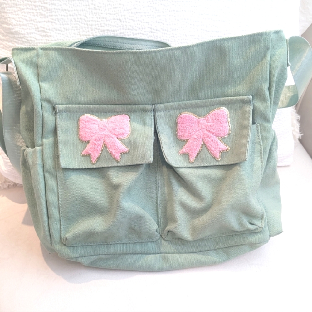Large green shoulder bag with pink bows 🎀